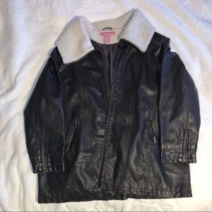 Woman Within Leather Jacket